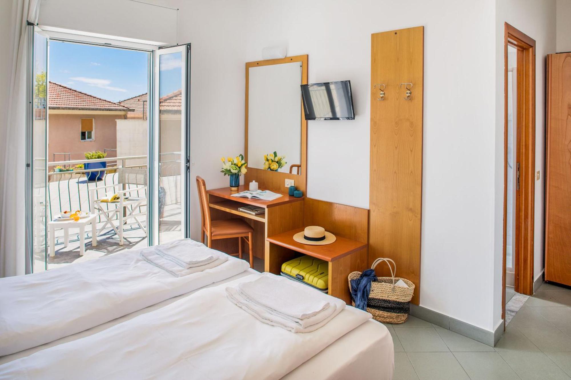 Hotel Tritone ไลเกวญา ภายนอก รูปภาพ